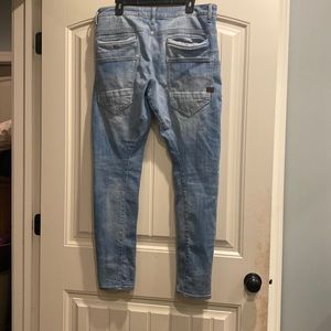 A pair of gently used G-star raw jeans